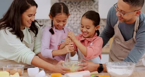 Loving Family Baking Together in Kitchen at Home