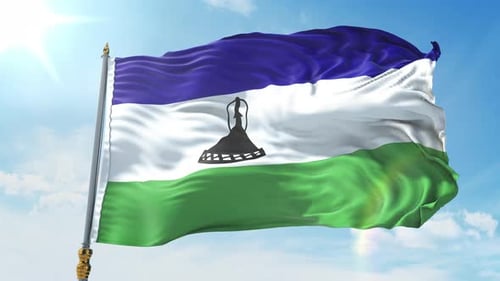 Realistic Waving Flag of Lesotho against Blue Sky