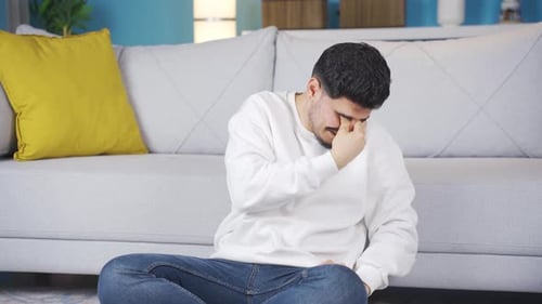 Crying young man.
