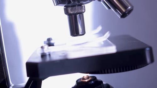 Close up of calibrating a microscope.