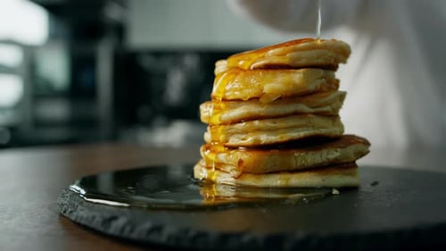 Honey Drizzled Over Stack of Pancakes