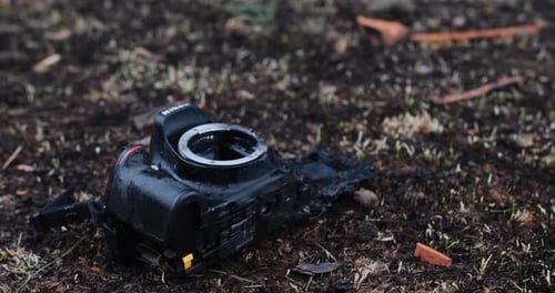 Damaged Camera on Ground After Destruction