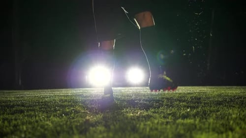 Soccer Player Athlete Training Foot Ball Sport on Soccer Field at Night