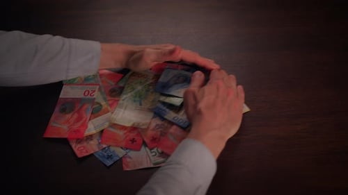 Close Up Dolly Shot Showing Many Different Swiss Franc Banknotes Cash Money Counting Swiss Francs
