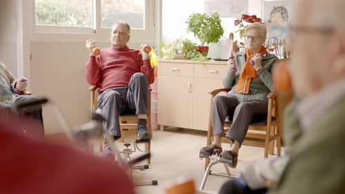 Senior Men and Women Exercising in a Nursing Home