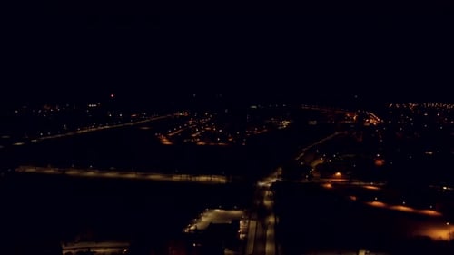 Fireworks in the city to welcome the New Year. Flying through the small town of Valmiera.