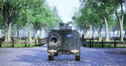 Military Vehicle Navigating a Serene Park Under Bright Daylight