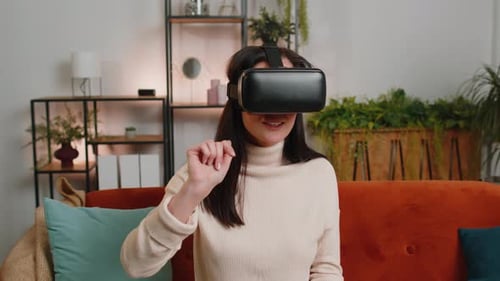 Woman Experiencing Virtual Reality with Headset Indoors