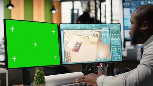 Man Works with Green Screen and 3D Model