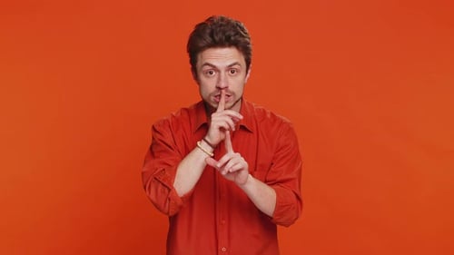 Young Man Presses Finger to Lips Make Silence Gesture Sign Do Not Tells Secret Stop Gossip Privacy