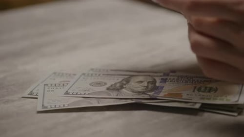 Counting Hundred Dollar Bills Close Up