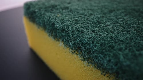 Close-Up of a Kitchen Sponge with Scrubbing Surface