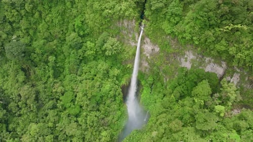 Experience the Stunning Aerial View of a Magnificent Costa Rica Waterfall in Exquisite