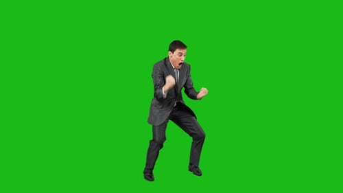 Excited Man Celebrates Success Against Green Screen