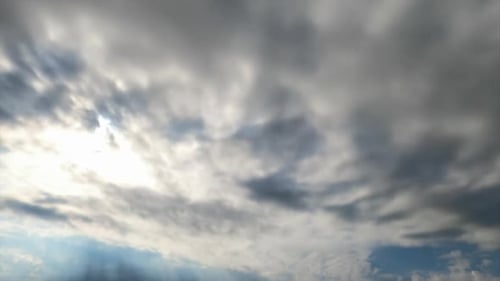 Dramatic Time-Lapse of Grey Clouds Passing Overhead