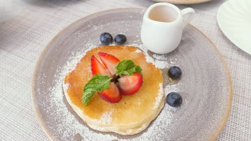 Pancake with Strawberries, Blueberries, and Mint