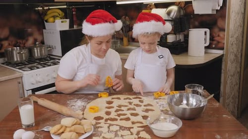 Festive Baking: Mom and Son Making Christmas Cookies