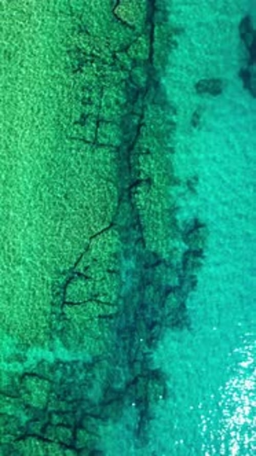 Turquoise Sea And Rocks