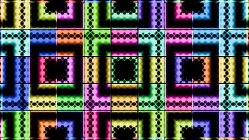Des motifs géométriques colorés pulsent de façon rythmique dans un affichage lumineux éclatant