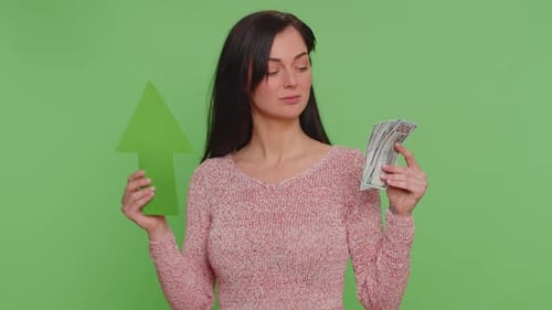 Woman Holds Cash and Arrow Upward