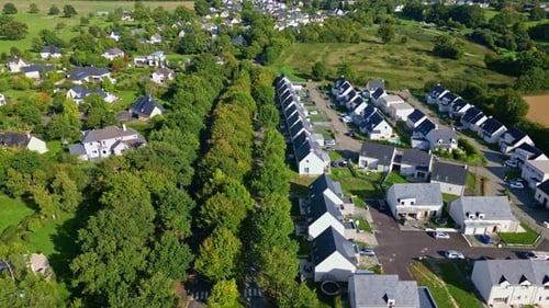 Aerial View of Suburban Neighborhood on Sunny Day