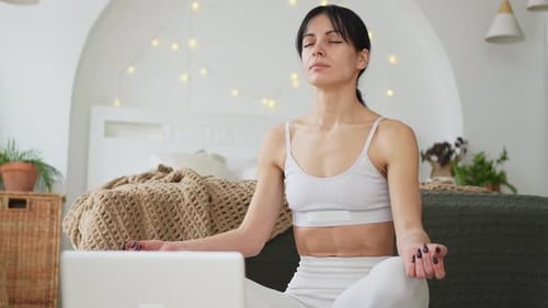 Yoga Mindfulness Meditation Online Woman Practicing Yoga with Online Lessons in Laptop at Home Woman