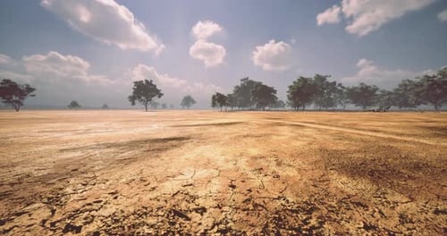 Arid Desert Landscape Flyover with Cracked Earth