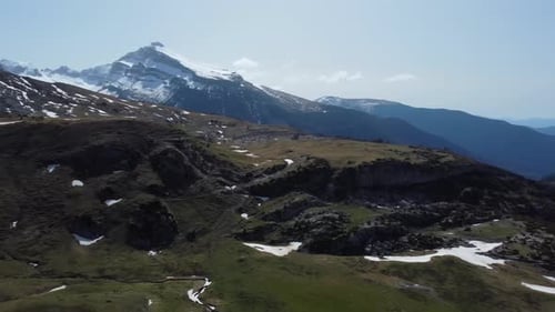 Mountain background during early spring with snow