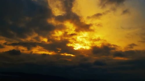 Dramatic sunset with dark clouds