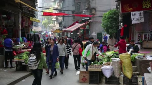 Scène de marché de rue animée à Guangzhou, en Chine, un jour de décembre