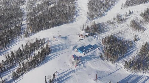 Aerial View Ski Resort Amidst Winter Forest Snowy Paradise Ski Resort Haven for Winter Enthusiasts