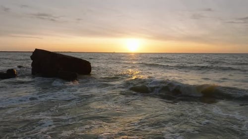 Beautiful aerial establishing view of Karosta (Liepaja) concrete coast fortification ruins, vibrant