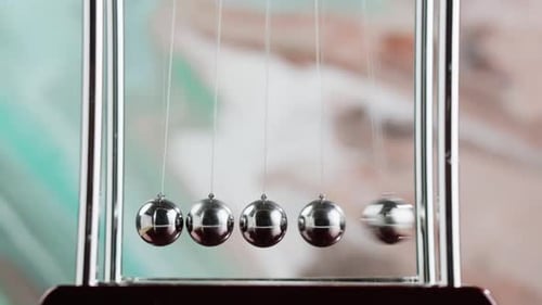 Classic Newton's Cradle Demonstration With Metal Spheres