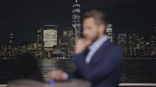 Businessman Using Laptop in City at Night Mature Businessman Overtime Work Outdoor Successful