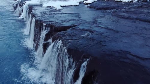 Waterfall in Iceland Snowy Ice Mountain River in Winter Nature