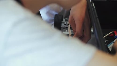 Building a toy car from plastic blocks