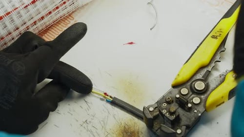 Close up of an electrical soldering wires with special equipment. Creative. Process of repairing