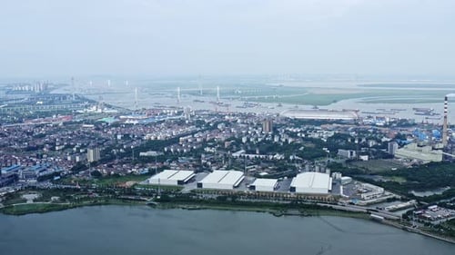 erial view of chimneys of power plant, an industrial district. Modern large thermal power plant