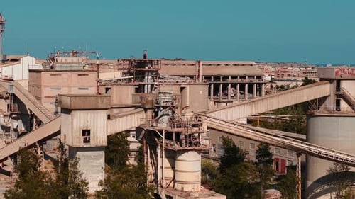 Derelict Industrial Complex Showing Decay and Urban Abandonment on a Sunny Day