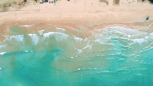 Aerial View to Tropical Sandy Beach and Blue Ocean Top View of Ocean Waves Reaching Shore on Sunny