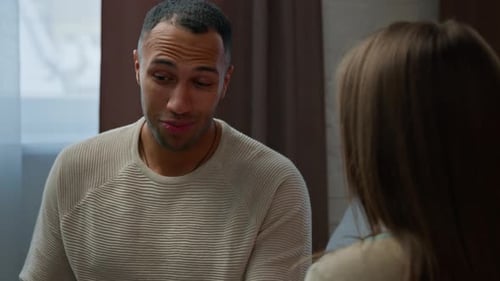 Man Talking and Gesturing Indoors in Close-up