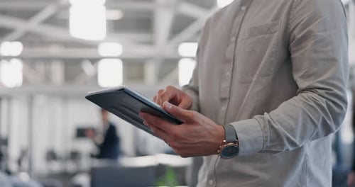 Businessman, hands and working on tablet in busy office, analytics app or iot