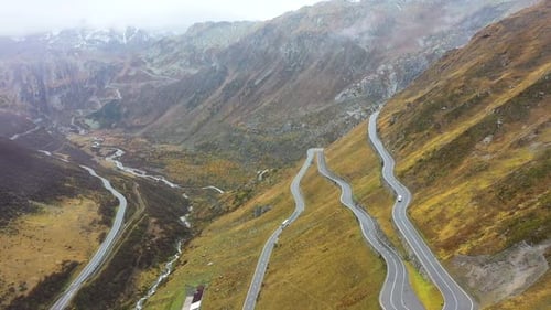 View on Grimselpass high mountian alpine road and Swiss Alps in background . Furka pass, Switzerland