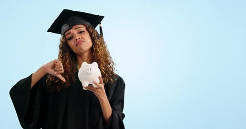 Happy woman, student and piggy bank for savings, investment or tuition fund against a studio