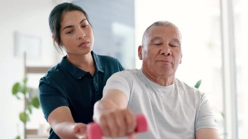 Physical Therapy with Dumbbell for Senior Man