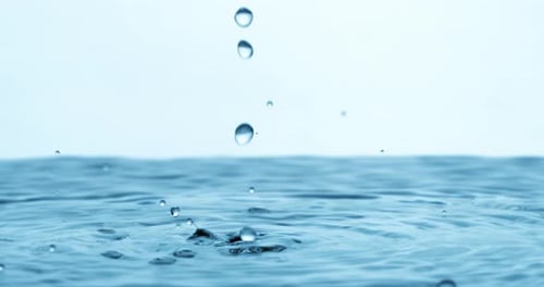 Water Drops close-up of water falls in a super slow motion. Shot on super slow motion camera 1600
