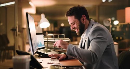 Night, celebration or man on computer in office, stock purchase or financial growth for company