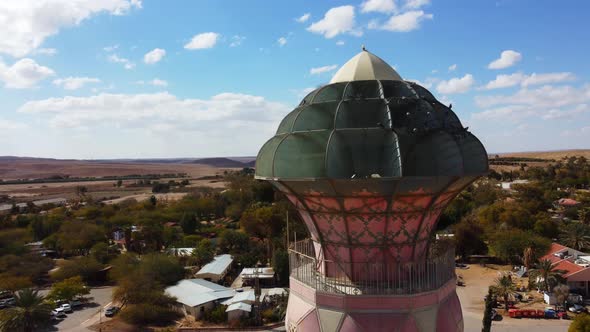 Drone circles around Neot Smadar Arts Center cooling tower revealing ...