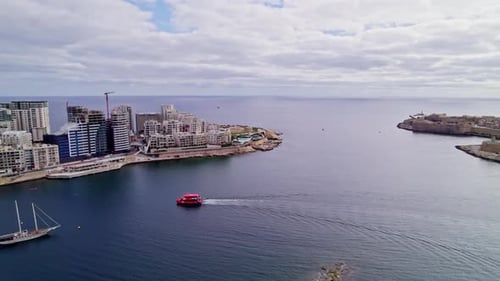 Boat in Beautiful Sliema Harbor on Mediterranean Coast of Malta, Aerial