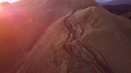 Aerial video of Mount Pulag at sunset with people in the background, the third highest mountain